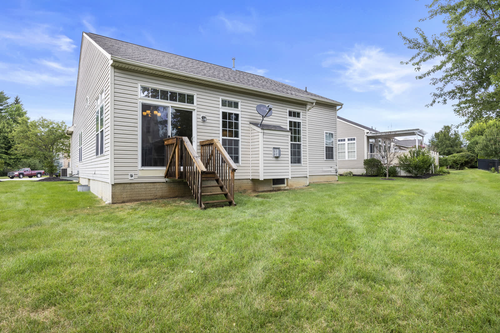 Rear exterior and deck at 5052 Forestland Ct, Brunswick OH